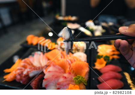 Sashimi and sashimion a plate in a Japanese restaurant Sashimi and sashimion a plate in a Japanese restaurant 82982108