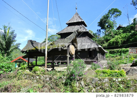 WEST SUMATERA, INDONESIA -JUNE 8, 2014: Tuo Kayu Jao Mosque is located in West Sumatra, Indonesia. Built in 1599 and is the second oldest mosque in Indonesia. WEST SUMATERA, INDONESIA -JUNE 8, 2014: Tuo Kayu Jao Mosque is located in West Sumatra, Indonesia. Built in 1599 and is the second oldest mosque in Indonesia. 82983879