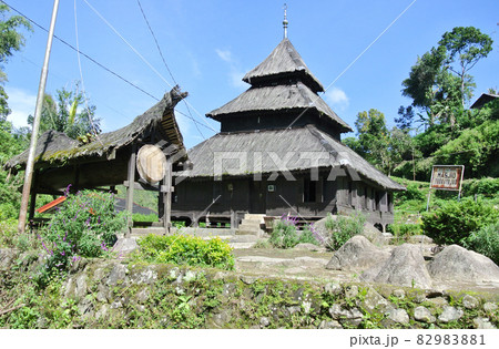 WEST SUMATERA, INDONESIA -JUNE 8, 2014: Tuo Kayu Jao Mosque is located in West Sumatra, Indonesia. Built in 1599 and is the second oldest mosque in Indonesia. WEST SUMATERA, INDONESIA -JUNE 8, 2014: Tuo Kayu Jao Mosque is located in West Sumatra, Indonesia. Built in 1599 and is the second oldest mosque in Indonesia. 82983881