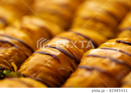 Turkish baklava dessert with honey, close up Turkish baklava dessert with honey, close up 82985431