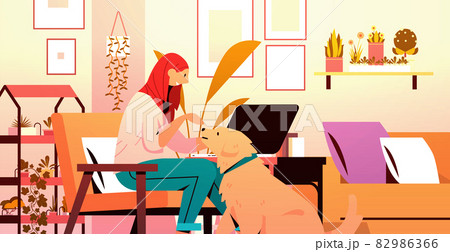 young woman spending time with dog female owner and cute domestic animal friendship with pet concept young woman spending time with dog female owner and cute domestic animal friendship with pet concept 82986366