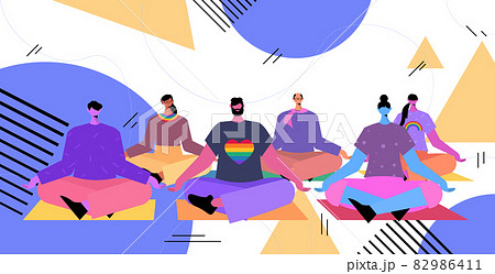people practicing yoga exercise in lotus pose LGBT parade pride festival transgender love concept people practicing yoga exercise in lotus pose LGBT parade pride festival transgender love concept 82986411