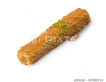 Turkish sweet pastry baklava isolated on white background Turkish sweet pastry baklava isolated on white background 82986712