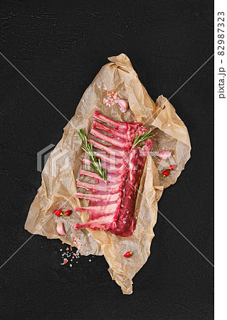 Top view of rack of lamb in wrapping paper 82987323