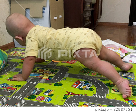 Beautiful baby boy with child face posing photographer 82987551