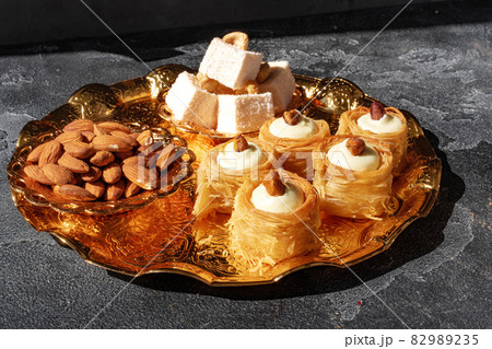 Turkish dessert baklava with nuts on black background 82989235