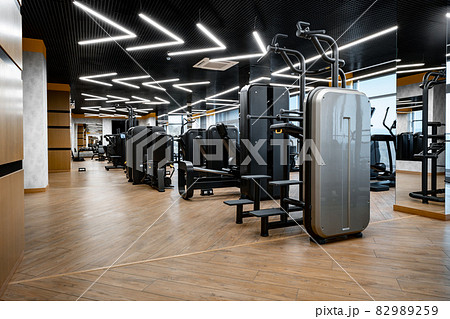 Modern gym interior with new fitness equipment Modern gym interior with new fitness equipment 82989259