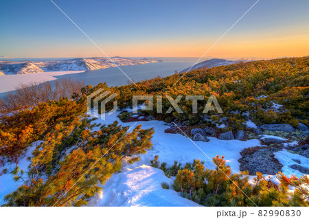 Beautiful seacoast landscape with hills, cape and bay. Beautiful seacoast landscape with hills, cape and bay. 82990830