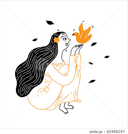 A beautiful girl with long hair is teasing with a little bird. A beautiful girl with long hair is teasing with a little bird. 82998297