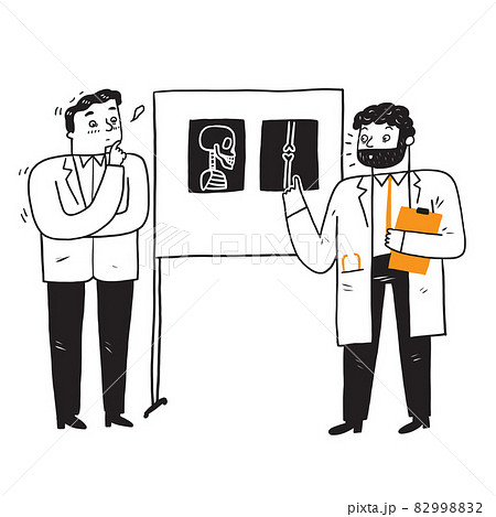 Two doctors are examining and diagnosing the patient from the x-ray 82998832