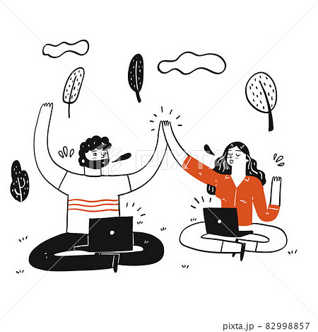 Man and girl sit in the park doing Hi5 with laptop on their legs 82998857