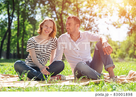 Couple on a picnic in the park Couple on a picnic in the park 83001898