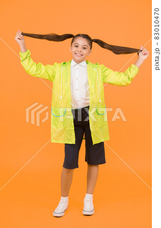 Kids raincoats with vibrant shapes unique designs. Kids raincoats with vibrant shapes unique designs. 83010470