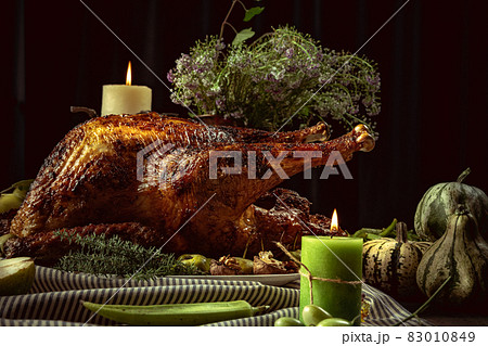 Greeting card design with roasted turkey, chicken and autumn traditional vegetables. Figs, pumpkins. Thanksgiving day 83010849