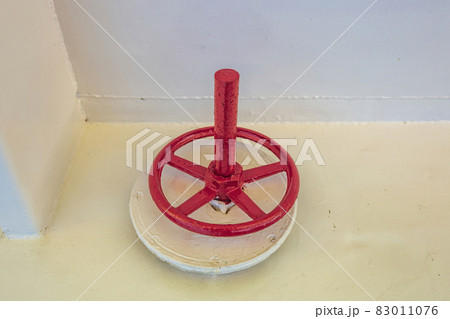 Old weathered iron industrial outdoor pipeline valve Old weathered iron industrial outdoor pipeline valve 83011076