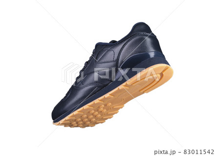 Sport shoes. Black sneaker on a white background. Shoe. Sport shoes. Black sneaker on a white background. Shoe. 83011542