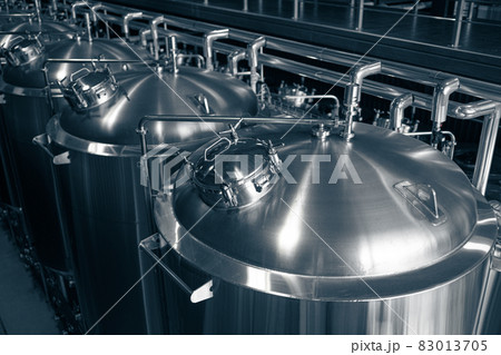 Modern brewery production steel tanks and pipes, machinery tools and vats, beer production Modern brewery production steel tanks and pipes, machinery tools and vats, beer production 83013705