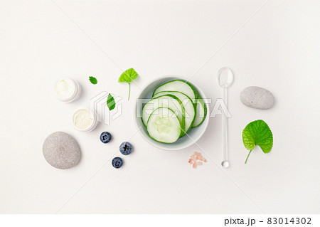 Handmade organic bio nature cosmetics with herbal ingredients on gray background. Natural beauty and spa concept. Space for text 83014302