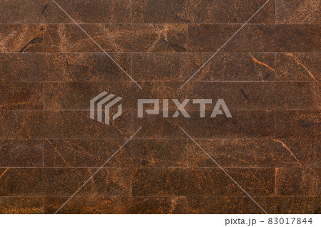 flat wall covered with rectangular natural tan brown granite tiles flat wall covered with rectangular natural tan brown granite tiles 83017844