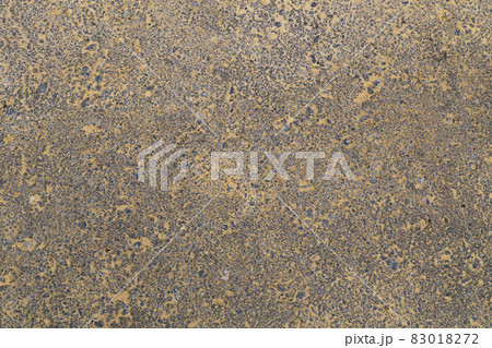 yellow sand over asphalt texture and background, view from above yellow sand over asphalt texture and background, view from above 83018272