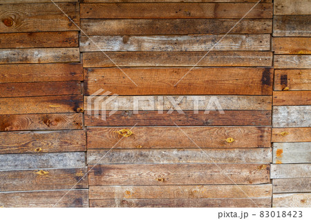 orange uncoated wooden planks wall suface texture and background 83018423