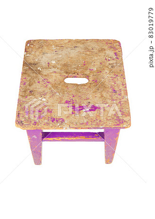 Old wooden stool with peeling pink paint. Loft style chair isolated on a white background. Old wooden stool with peeling pink paint. Loft style chair isolated on a white background. 83019779