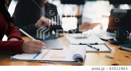 Business team is brainstorming with charts and analyzing or studying for investments. Account, Finance, Tax, concept. Business team is brainstorming with charts and analyzing or studying for investments. Account, Finance, Tax, concept. 83022863