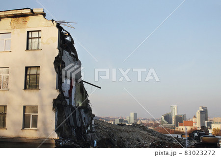 Demolished old building remains with city view Demolished old building remains with city view 83023272