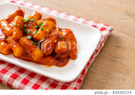 Korean rice cake stick with sausage in spicy sauce - Tteokbokki 83030724