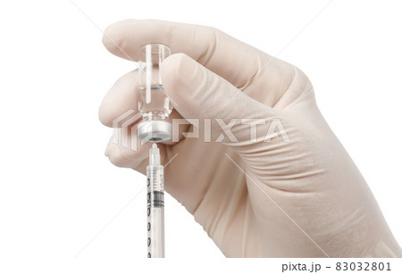 Syringe, medical injection vaccination in hand with glove isolated on white background. Syringe, medical injection vaccination in hand with glove isolated on white background. 83032801