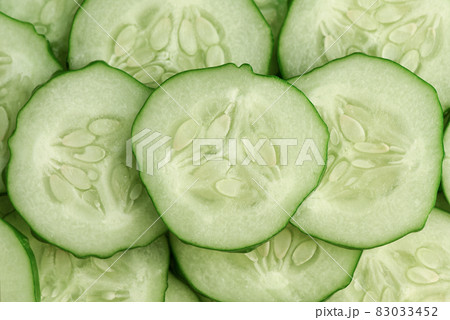 Fresh slice cucumber close-up background.  83033452