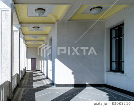 View of the columns in the gallery in an unknown building.  83035210