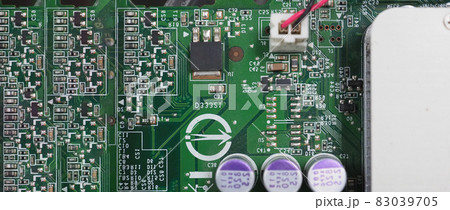 Semiconductor. cpu chip located on the green motherboard of the computer. Semi conductor motherboard circuit board. Hightech computer board with manufacture chip pcb technology. Smart phone iot chip. 83039705
