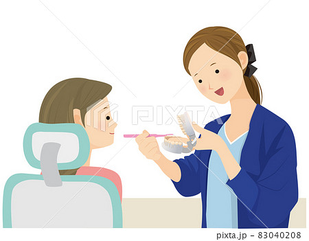 歯磨き指導をする歯科衛生士の女性 83040208