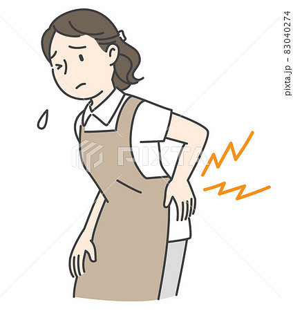 腰痛で腰をさするエプロン姿の女性 83040274