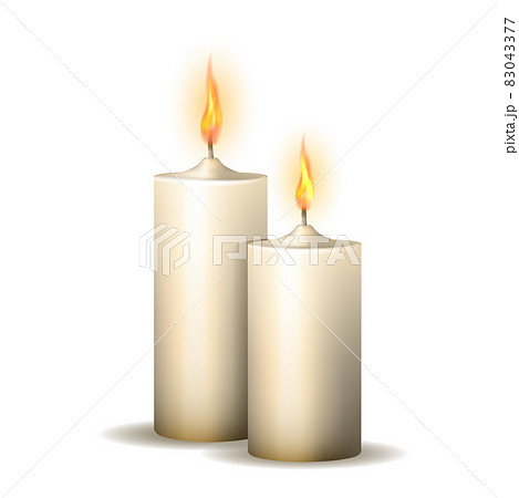 Two realistic burning candles isolated on white background. Two realistic burning candles isolated on white background. 83043377