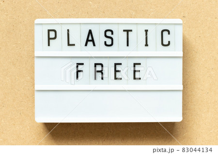 Lightbox with word plastic free on wood background Lightbox with word plastic free on wood background 83044134
