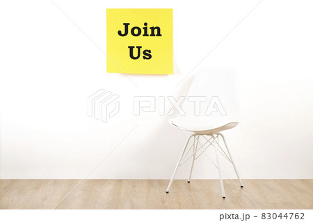 Head hunting help wanted poster concept. Minimalistic composition with chair and blank copy space wall. Head hunting help wanted poster concept. Minimalistic composition with chair and blank copy space wall. 83044762