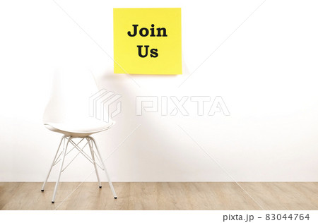 Head hunting help wanted poster concept. Minimalistic composition with chair and blank copy space wall. Head hunting help wanted poster concept. Minimalistic composition with chair and blank copy space wall. 83044764