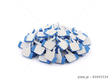 Many blue like thumb up icons on white background with clipping path. Social media concept Many blue like thumb up icons on white background with clipping path. Social media concept 83045534