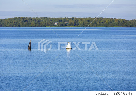 Navigation buoy on the water surface of the river Navigation buoy on the water surface of the river 83046545