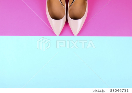 Top view of fashionable feminine medium heeled women's leather shoes of pastel colors on heels / wedge for spring-summer season. 83046751