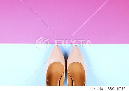 Top view of fashionable feminine medium heeled women's leather shoes of pastel colors on heels / wedge for spring-summer season. Top view of fashionable feminine medium heeled women's leather shoes of pastel colors on heels / wedge for spring-summer season. 83046752