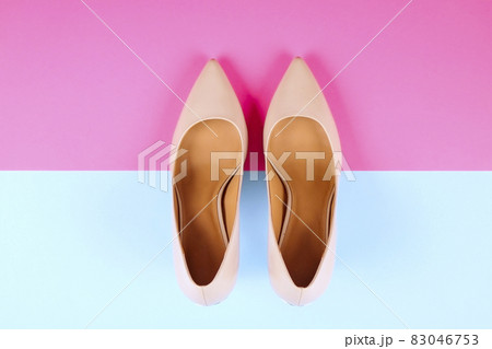 Top view of fashionable feminine medium heeled women's leather shoes of pastel colors on heels / wedge for spring-summer season. Top view of fashionable feminine medium heeled women's leather shoes of pastel colors on heels / wedge for spring-summer season. 83046753