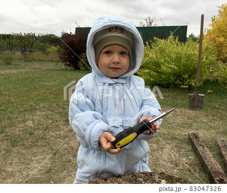 Beautiful baby boy with child face posing photographer Beautiful baby boy with child face posing photographer 83047326