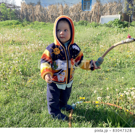 Beautiful baby boy with child face posing photographer Beautiful baby boy with child face posing photographer 83047328