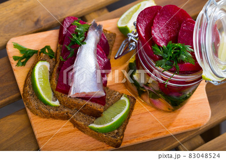 Homemade pickled blue whiting fish 83048524