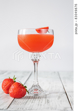 Glass of Bitter Fraise Cocktail 83049876