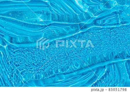 .Blue cosmetic gel texture with bubbles. Transparent skincare cream, face serum, moisturizer background. Liquid transparent skin care product sample. Beauty hyaluronic acid 83051798
