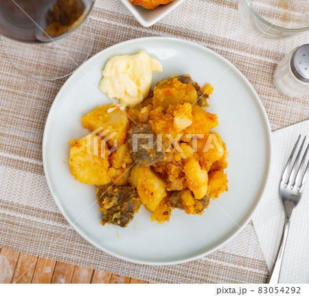 Homemade stewed veal with potato and carrot 83054292